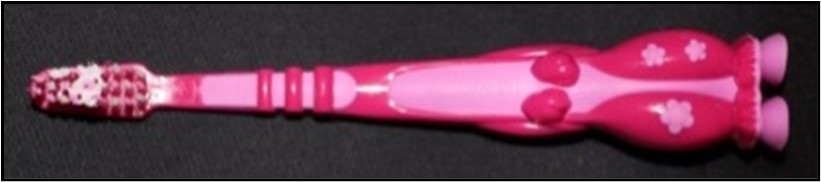 toothbrush with a smear of toothpaste