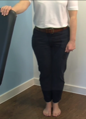 Stand with your feet as close together as possible