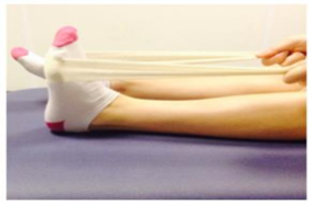 Image of pulling a foot with a towel or bandage