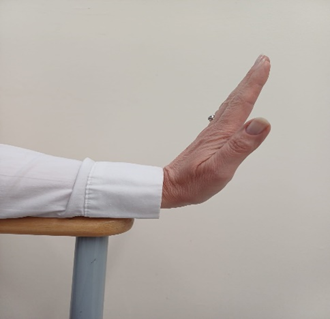 Wrist stretch, Lift your hands up and hold the stretch.