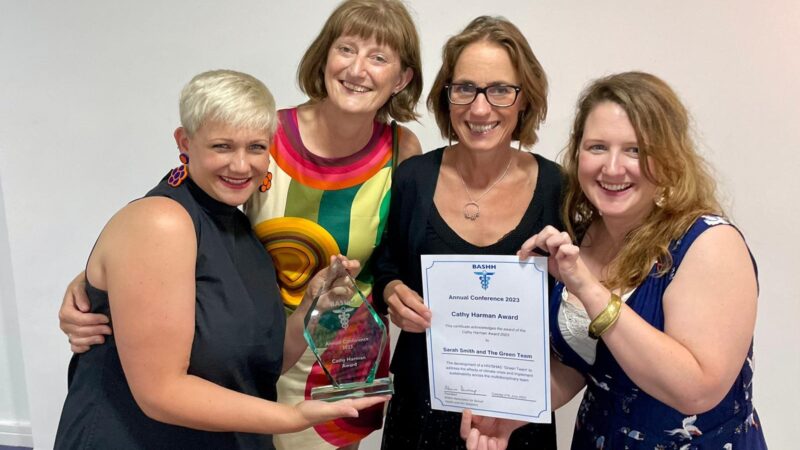 Members of the SHAC green team with the certificate