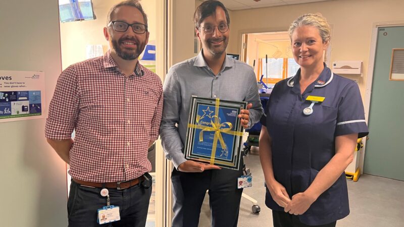 Praneil with his certificate alongside manager and Hospital Director of Nursing Tori Cooper