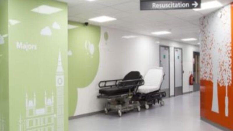 Resus corridor in Louisa Martindale Building. Image shows a bed in corridor.